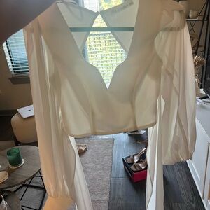 Saints secrets white top